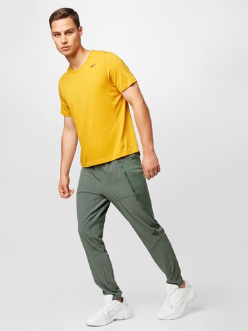 Reebok Performance Shirt in Yellow