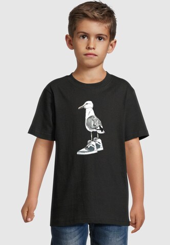 Mister Tee Тениска 'The Seagull Sneakers' в черно: отпред