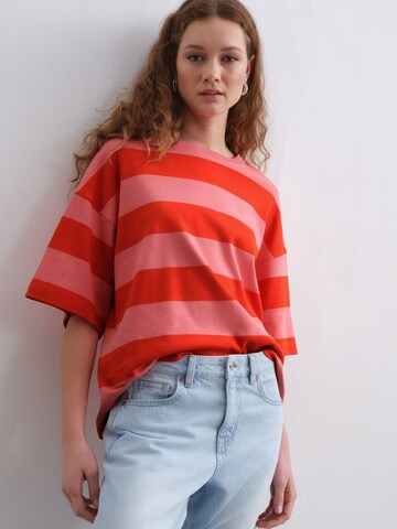 Next - Camisa em rosa: frente