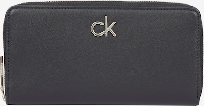 Calvin Klein Rahakott must, Tootevaade