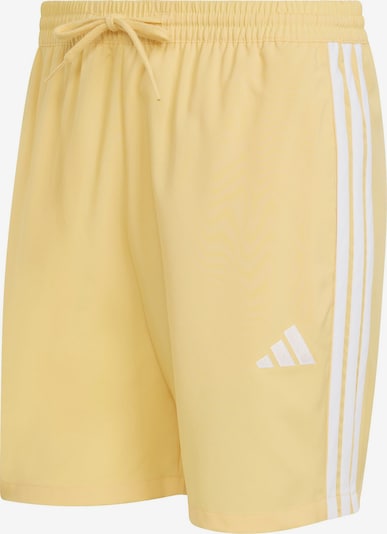 Sportinės kelnės 'Essentials Chelsea' iš ADIDAS SPORTSWEAR, spalva – geltona / balta, Prekių apžvalga