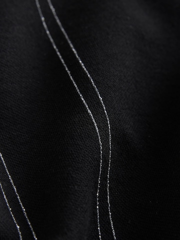 T-Shirt Next en noir