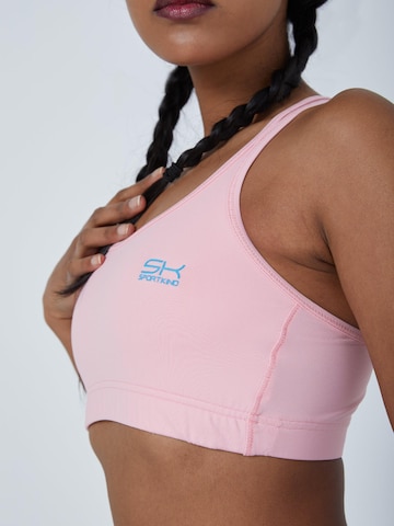 SPORTKIND BH 'Crossed Straps' in Pink: Vorderseite