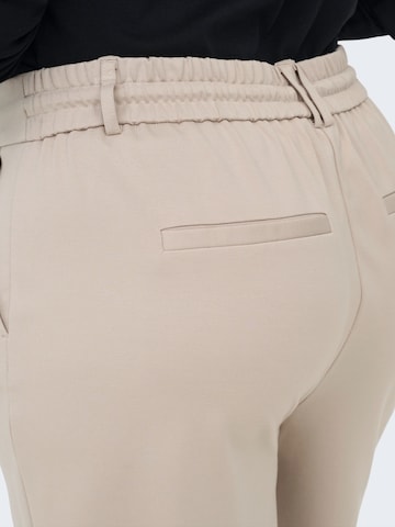 ONLY Carmakoma Regular Trousers 'CARGOLDTRASH' in Beige