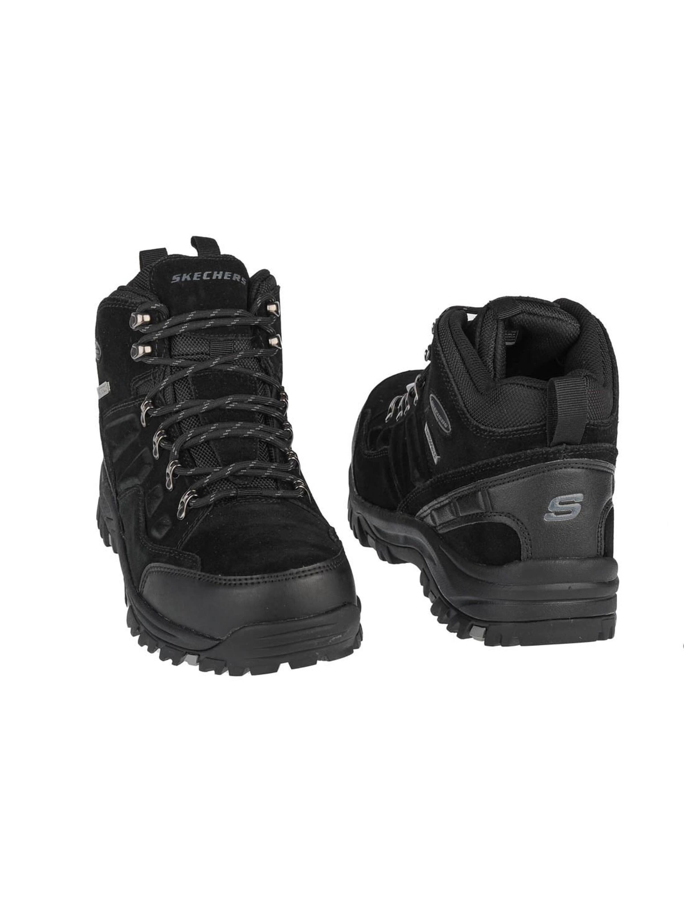 SKECHERS Boots in Zwart