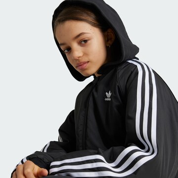ADIDAS ORIGINALS Between-Season Jacket 'Adicolor' in Black