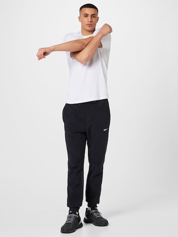 ReebokTapered Sportske hlače 'Workout Ready' - crna boja