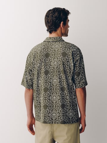 Next Poloshirt in Grün