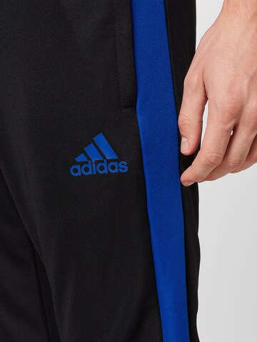 ADIDAS SPORTSWEAR Štandardný strih Športové nohavice 'Tiro Essential' - Čierna