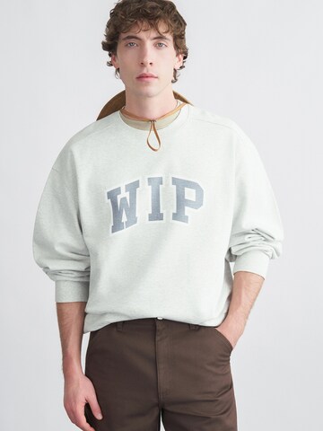 Carhartt WIP - Sudadera en gris: frente