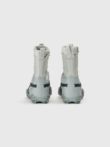 PUMA Veterlaarsjes 'Mostro' in Grijs