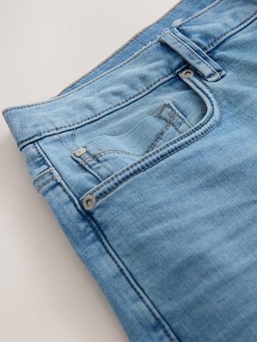 Next Liibuv Teksapüksid 'Motionflex', värv sinine