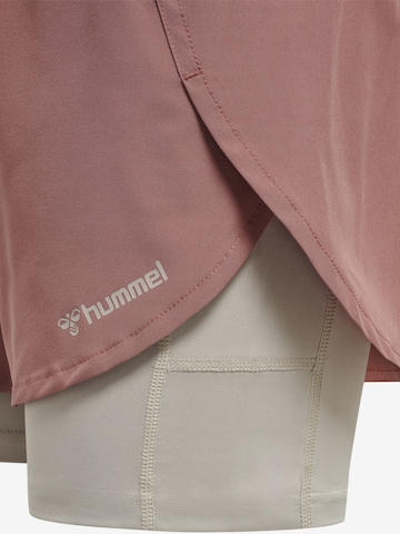 Coupe slim Pantalon de sport Hummel en rose