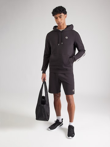 PUMA Sweatshirt 'Essentials' in Zwart