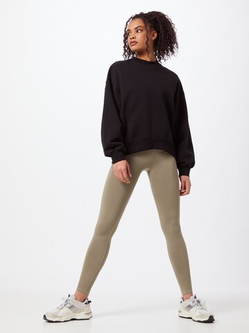 Skinny Pantalon de sport Hummel en vert