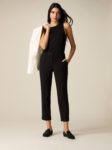 oltre - Tapered Pantalón en negro