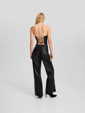 Tuta jumpsuit di Bershka in nero