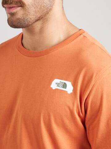 THE NORTH FACE Футболка в Оранжевый