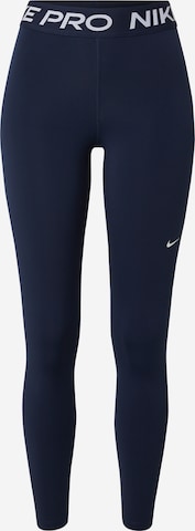 NIKE - Skinny Calças de desporto em azul: frente