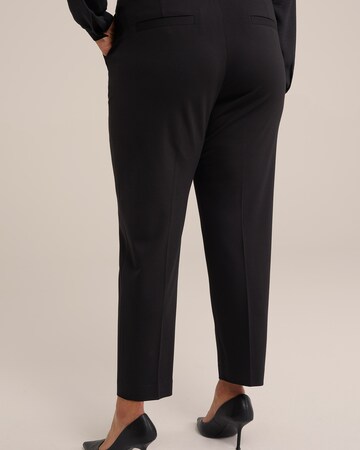 Slimfit Pantaloni con piega frontale di WE Fashion in nero