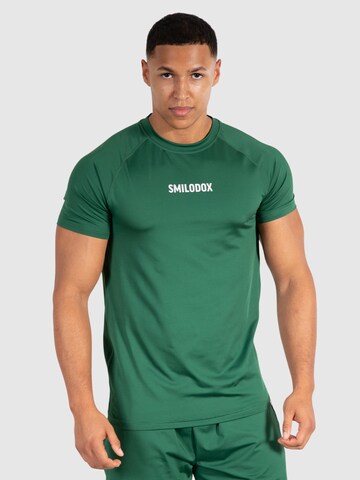 T-Shirt fonctionnel 'Maison' Smilodox en vert : devant