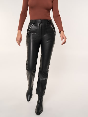 ABOUT YOU x Laura Giurcanu Boot cut Pants 'Sunny' in Black: front