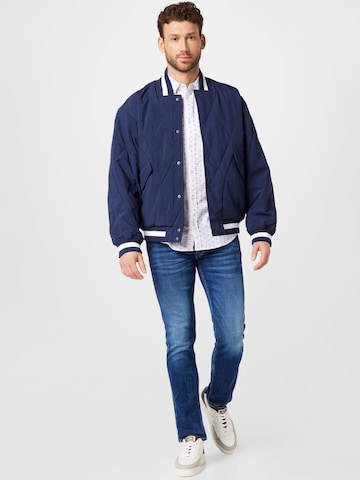 Tommy Jeans Between-Season Jacket 'Diamond' in Blue