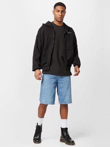 Karl Kani Zip-Up Hoodie in Black