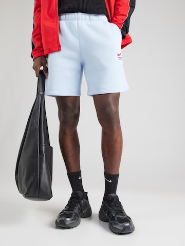 Loosefit Pantaloni di Nike Sportswear in blu: frontale