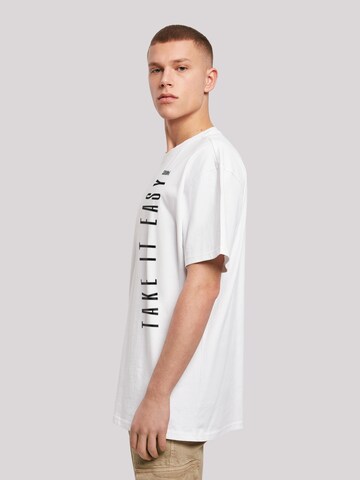 T-Shirt 'Take It Easy' F4NT4STIC en blanc
