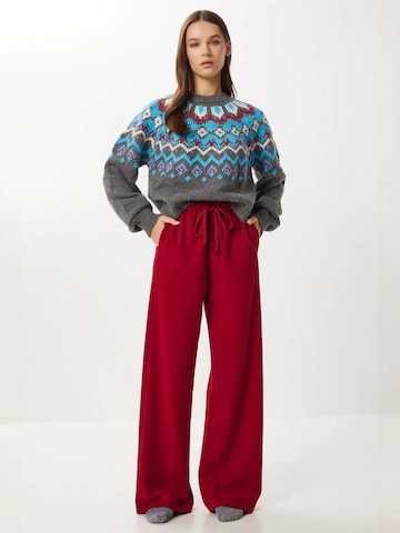 Wide leg Pantaloni 'Hose' di Happiness İstanbul in rosso