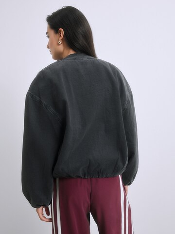 Next Tussenjas in Zwart