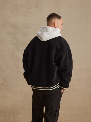 DAN FOX APPAREL Between-Season Jacket 'Tyler' in Black