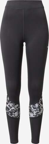 Skinny Pantaloni sportivi 'Modern Safari' di Reebok in nero: frontale