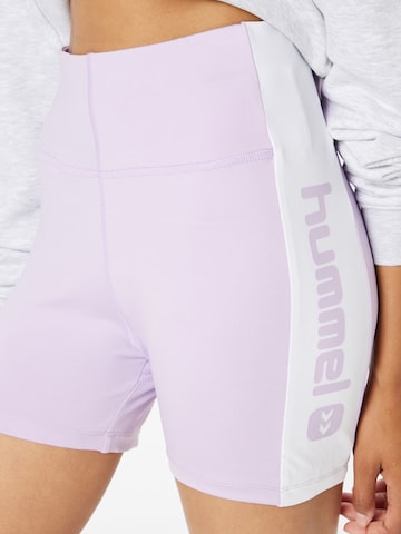 Hummel Skinny Spodnie sportowe 'Zella' w kolorze fioletowy