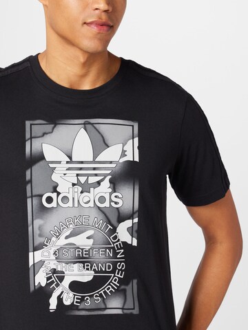 ADIDAS ORIGINALS Shirt 'Graphics Camo Tongue' in Black