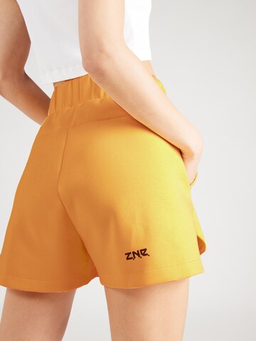 ADIDAS SPORTSWEAR Loose fit Sports trousers 'Z.N.E.' in Yellow