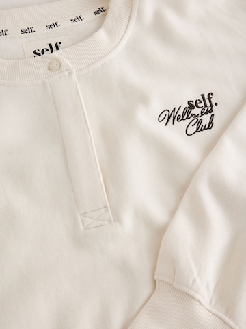 self. Sweatshirt i beige