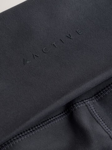 Next - Pierna ancha Pantalón deportivo en negro