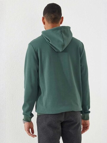 Sweat-shirt Tommy Life en vert