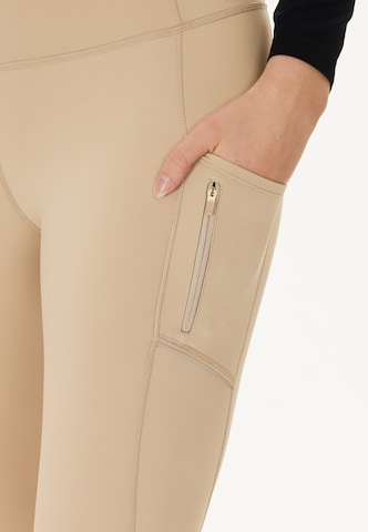 ENDURANCE Skinny Urheiluhousut 'Thadea' värissä beige