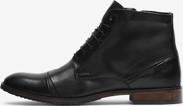 Kazar Lace-Up Boots in Black: front