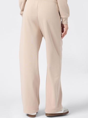 Loosefit Pantaloni di Champion Authentic Athletic Apparel in marrone