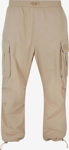 Loosefit Pantalon cargo Karl Kani en beige : devant