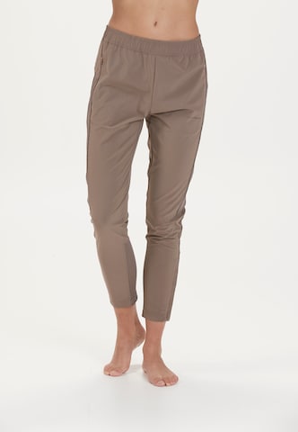 ENDURANCE Slim fit Workout Pants 'Medear' in Brown: front