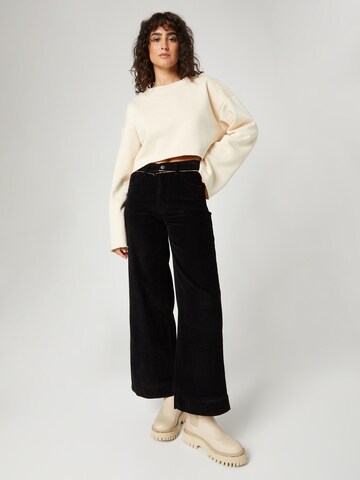 florence by mills exclusive for ABOUT YOU Wide leg Trousers 'Dandelion' in Black