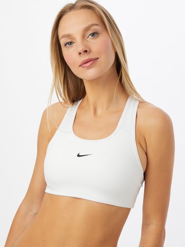 Bustier Soutien-gorge de sport NIKE en blanc : devant