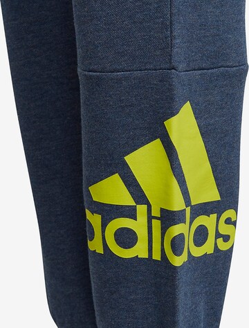 ADIDAS SPORTSWEAR Tapered Urheiluhousut värissä sininen