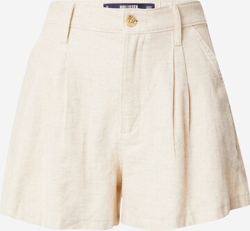 Regular Pantalon à plis HOLLISTER en beige : devant
