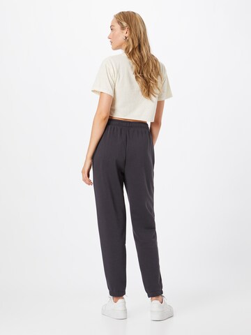 new balance Tapered Broek in Zwart